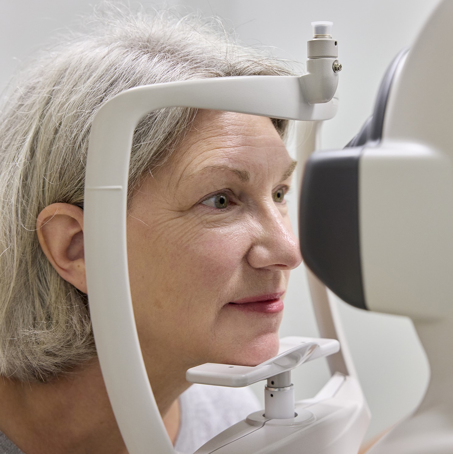 A female CLSA participant undergoes a eye assessment at a CLSA data collection site.